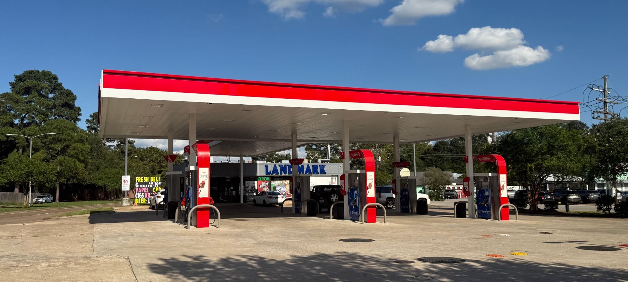 Landmark Exxon at 5590 Calder Ave, Beaumont: the red Exxon canopy over the fuel pumps, with the Landmark store behind