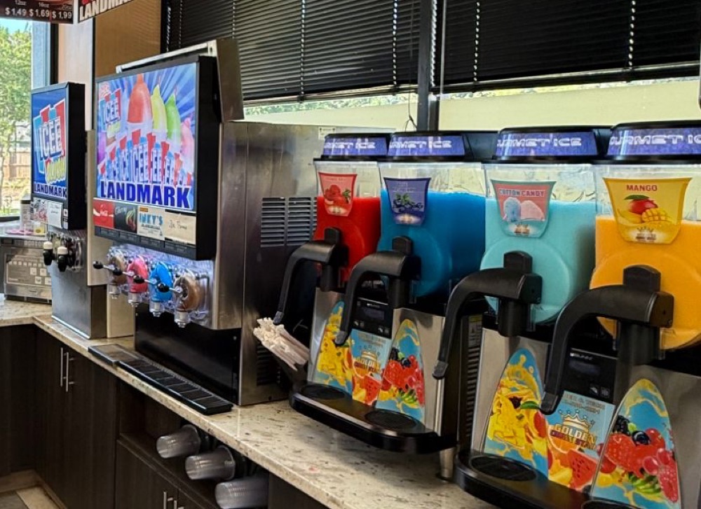 ICEE and slushie machines in red, blue, cotton candy and mango flavors